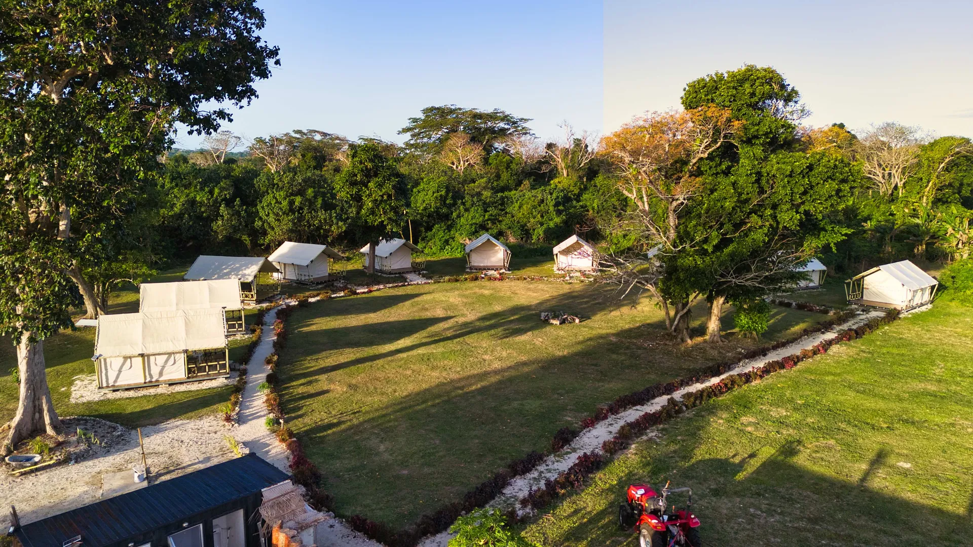 Peaceful glamping garden with lush greenery at Nawesa beachfront resort Vanuatu