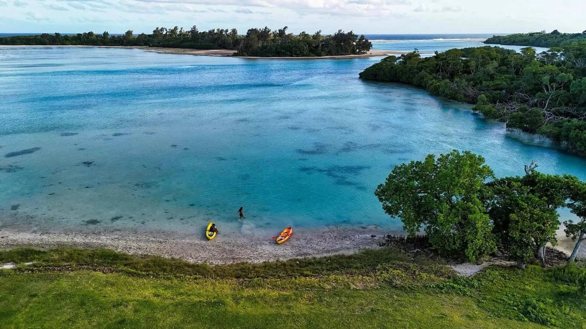 Ocean kayaking adventure at Nawesa Resort private beach Efate Island Vanuatu